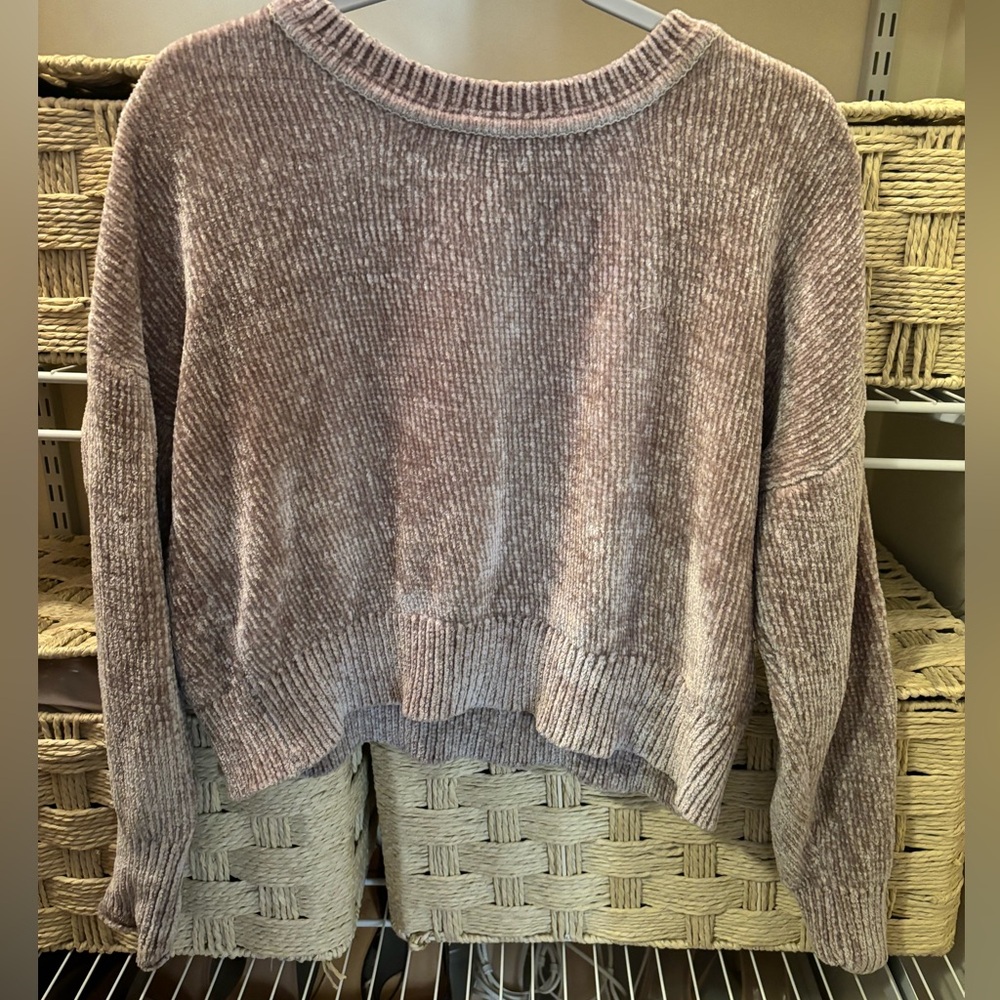 Tan sweater.
